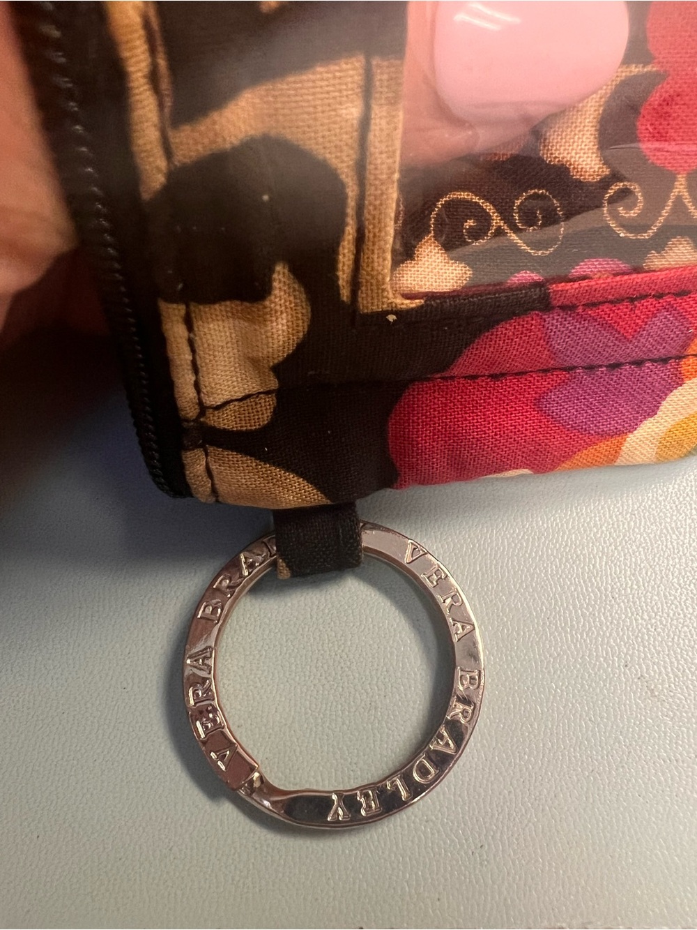 Zip ID case is featured in the retired “Suzani”pattern with floral design. - Picture 3 of 5